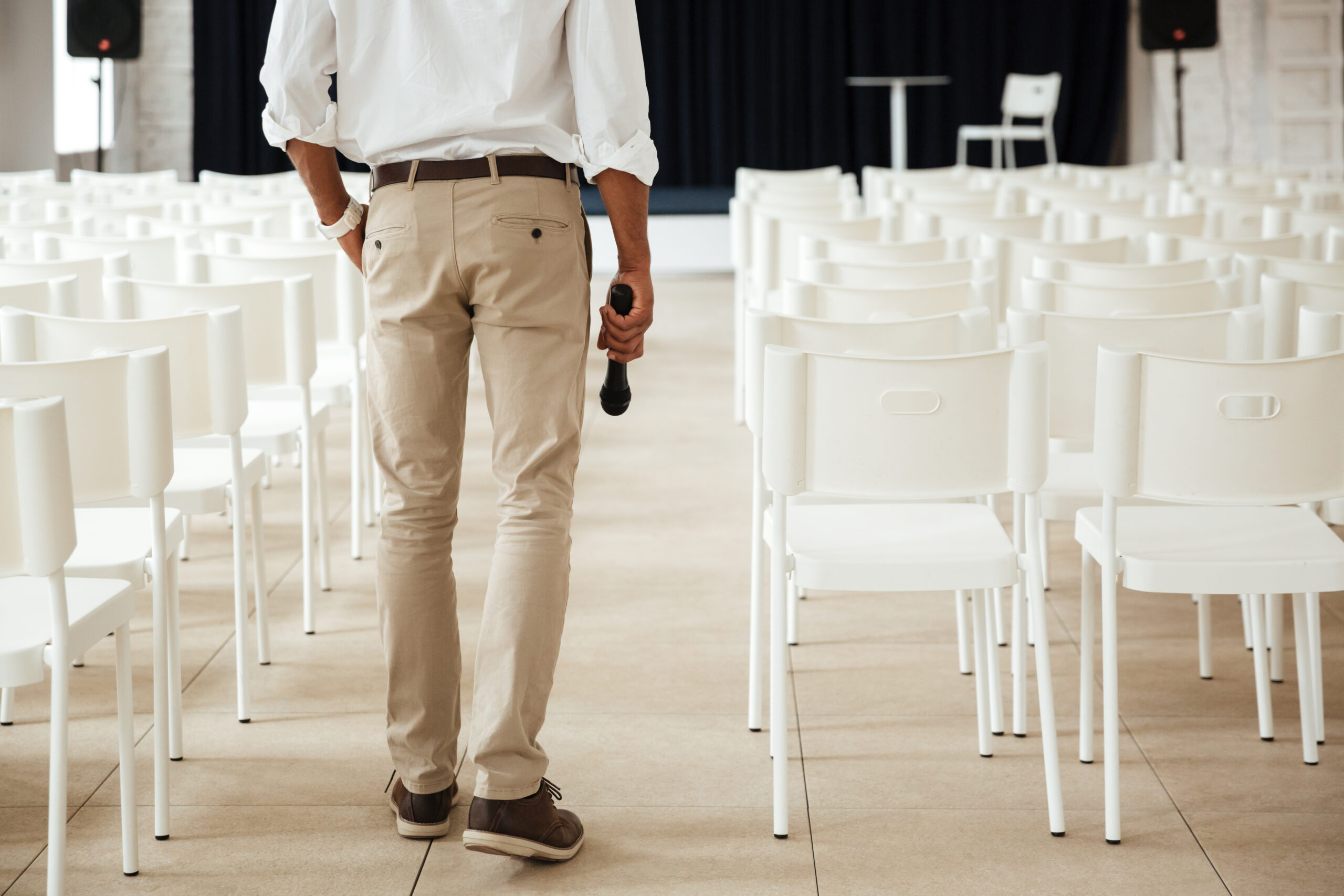 Cropped image of young african man standing in office